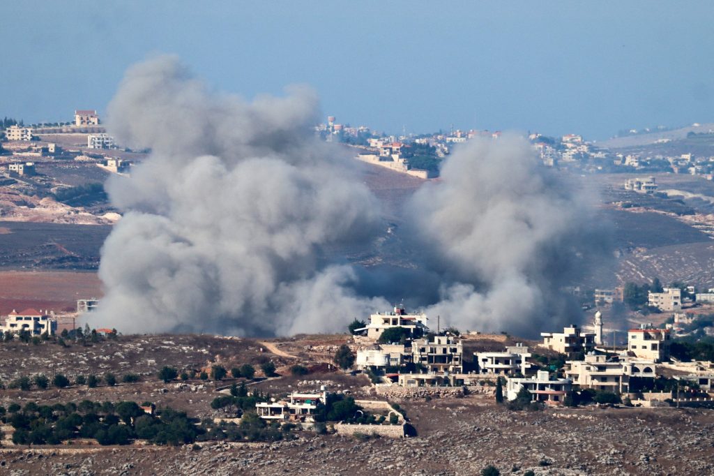 Smoke billows from the site of an Israeli airstrike that targeted the southern Lebanese village of Kfar Tibnit on October 21, 2024 (Photo by AFP)